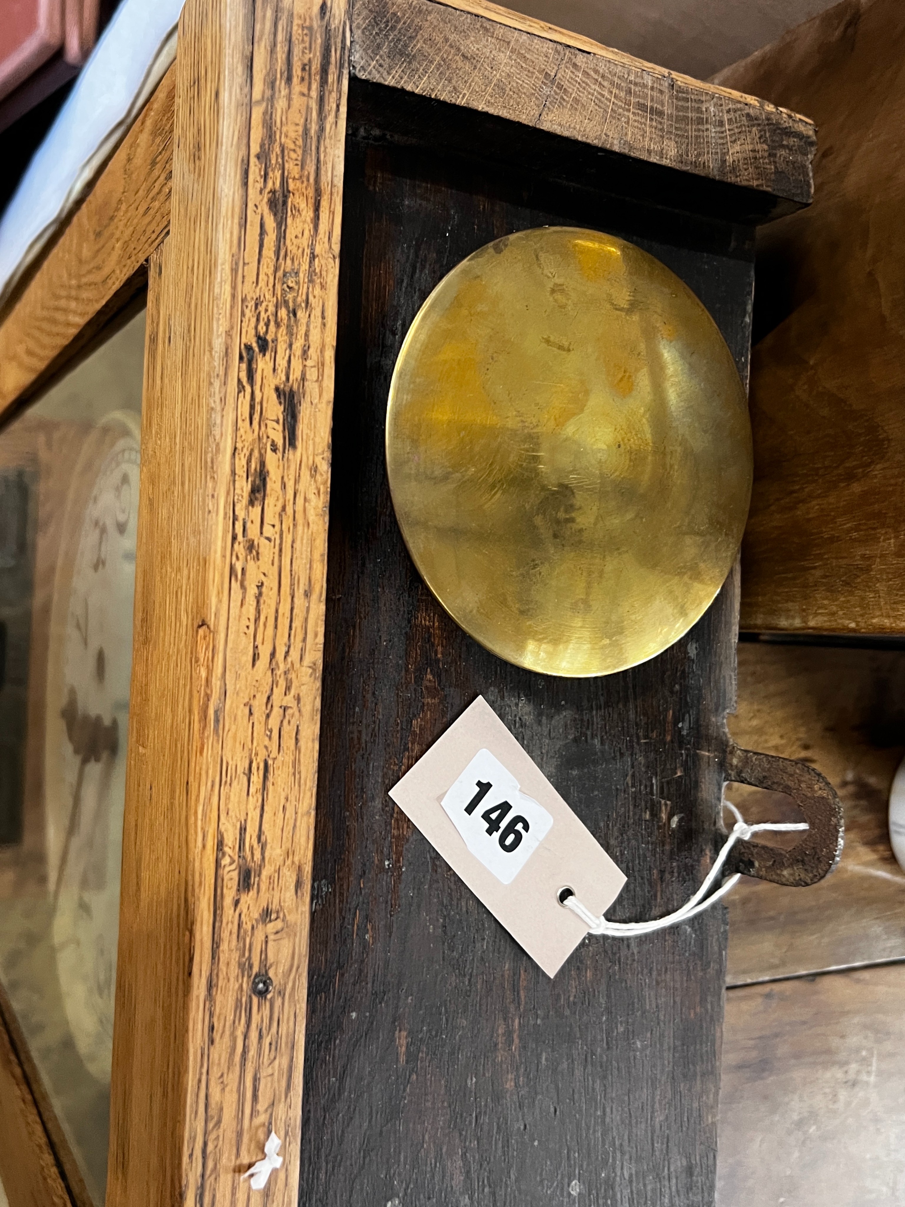 A vintage Gledhill-Brook oak cased clocking in machine, height 106cm